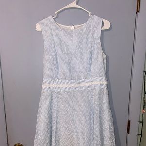 baby blue and white stripped with flower type of design